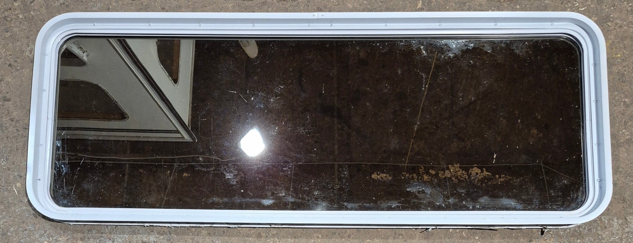 Used White Radius Non Opening Window : 60 1/4" W x 21 3/4" H x 1 7/8" D - Young Farts RV Parts