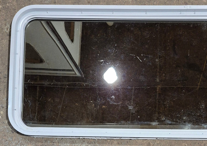 Used White Radius Non Opening Window : 60 1/4" W x 21 3/4" H x 1 7/8" D - Young Farts RV Parts