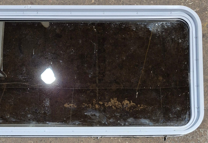 Used White Radius Non Opening Window : 60 1/4" W x 21 3/4" H x 1 7/8" D - Young Farts RV Parts