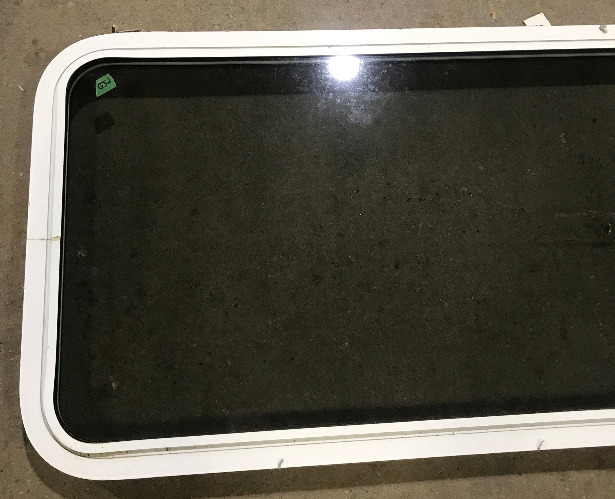 Used White Radius Non Opening Window : 60" W x 21 1/2" H x 1 7/8" D - Young Farts RV Parts