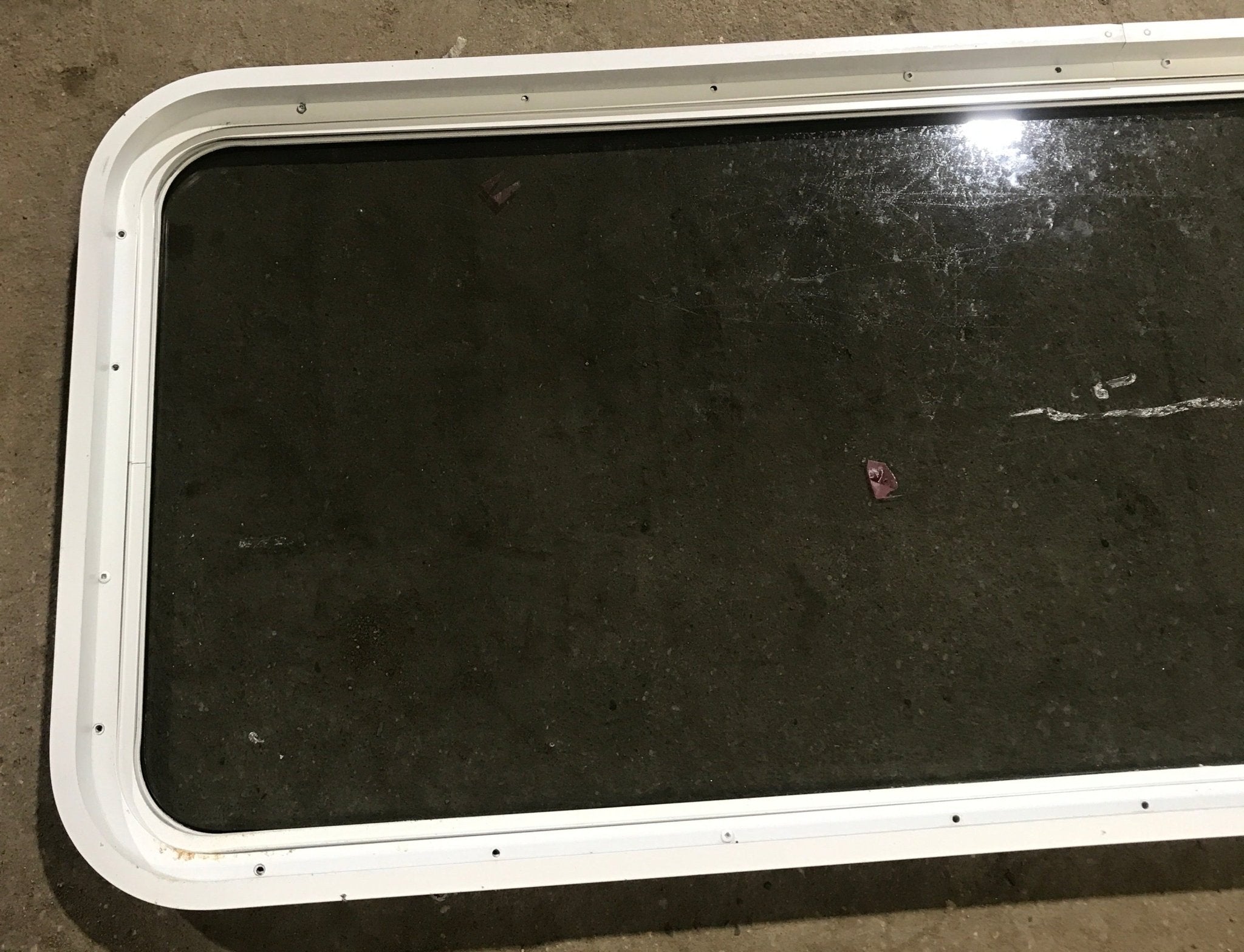 Used White Radius Non Opening Window : 60" W x 21 1/2" H x 1 7/8" D - Young Farts RV Parts