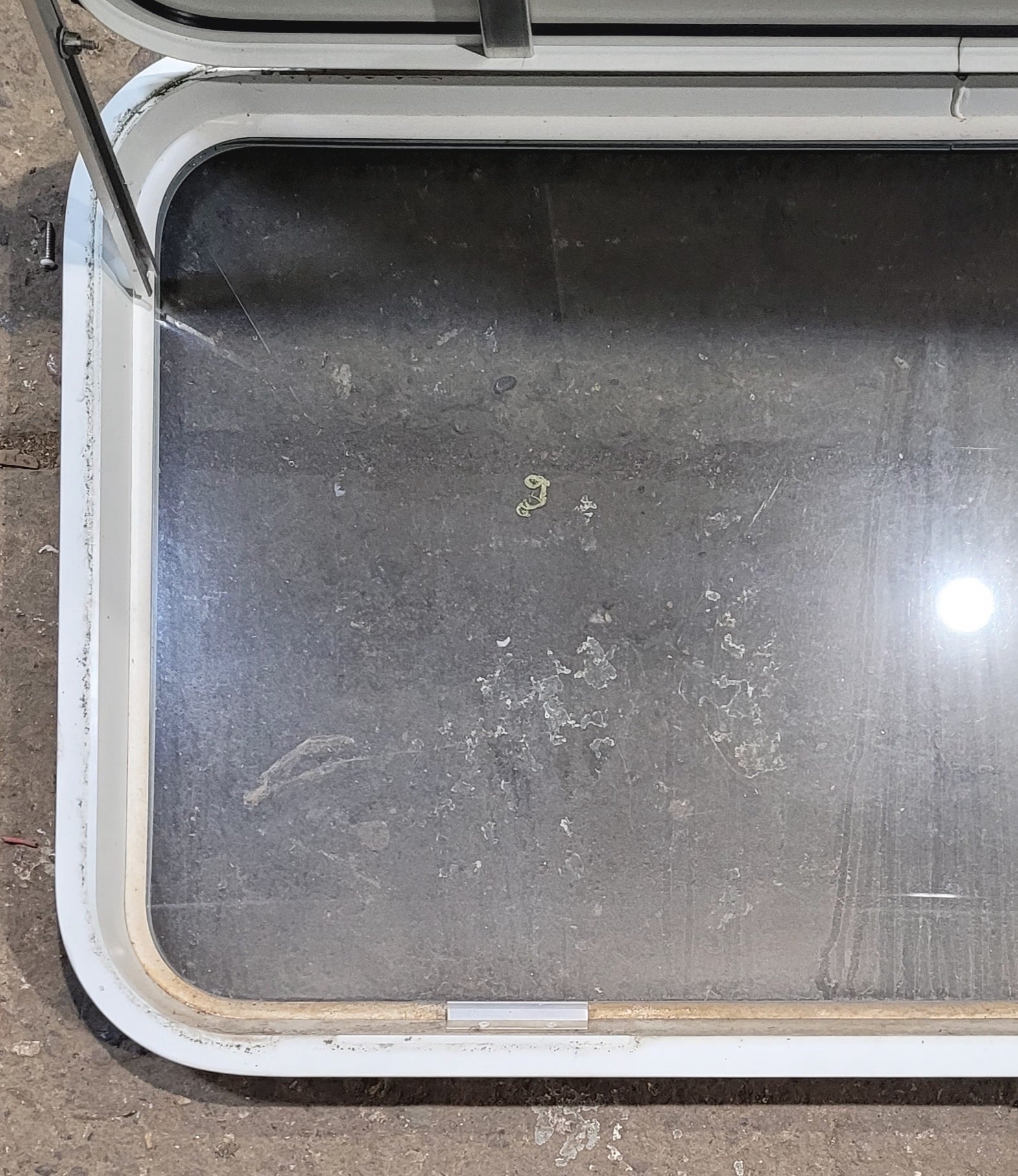 Used White Radius Non - Opening Window With Rock Guard Cover : 35 1/4" W x 21 1/4" H x 1 3/4" D - Young Farts RV Parts