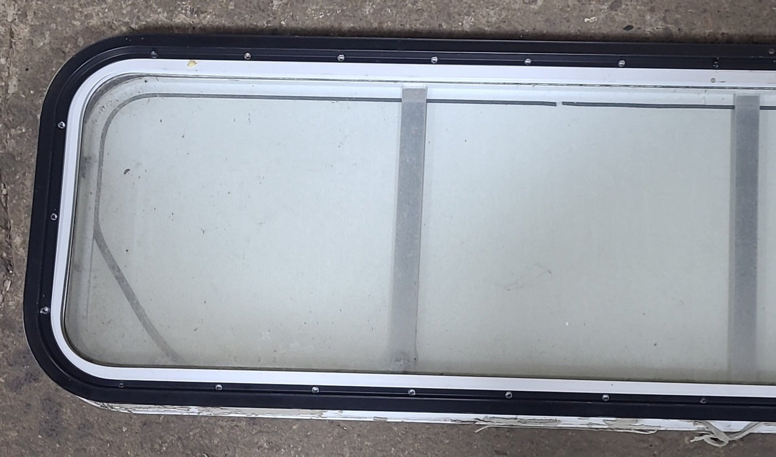 Used White Radius Non-Opening Window With Rock Guard Cover : 59 1/4