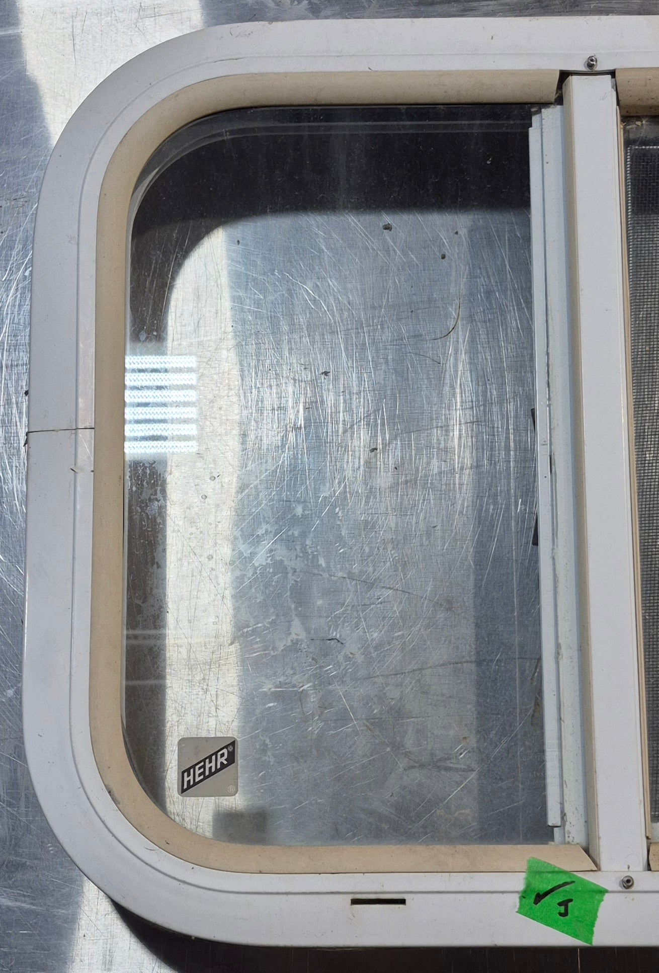 Used White Radius Opening Window : 17 1/2" W x 14 1/2" H x 1 7/8" D - Young Farts RV Parts