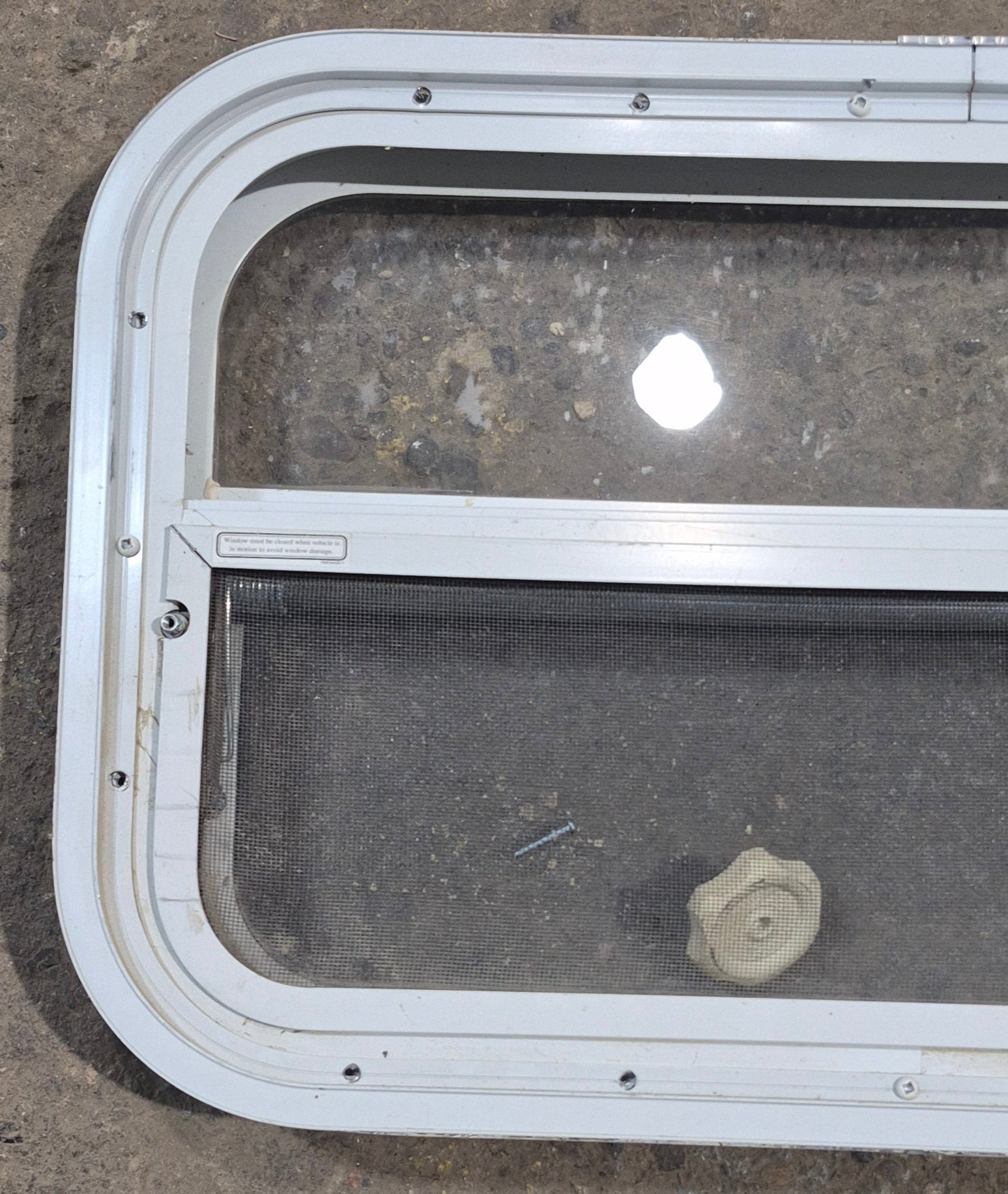 Used White Radius Opening Window : 23 1/2" W x 14 1/2" H x 1 7/8" D - Young Farts RV Parts