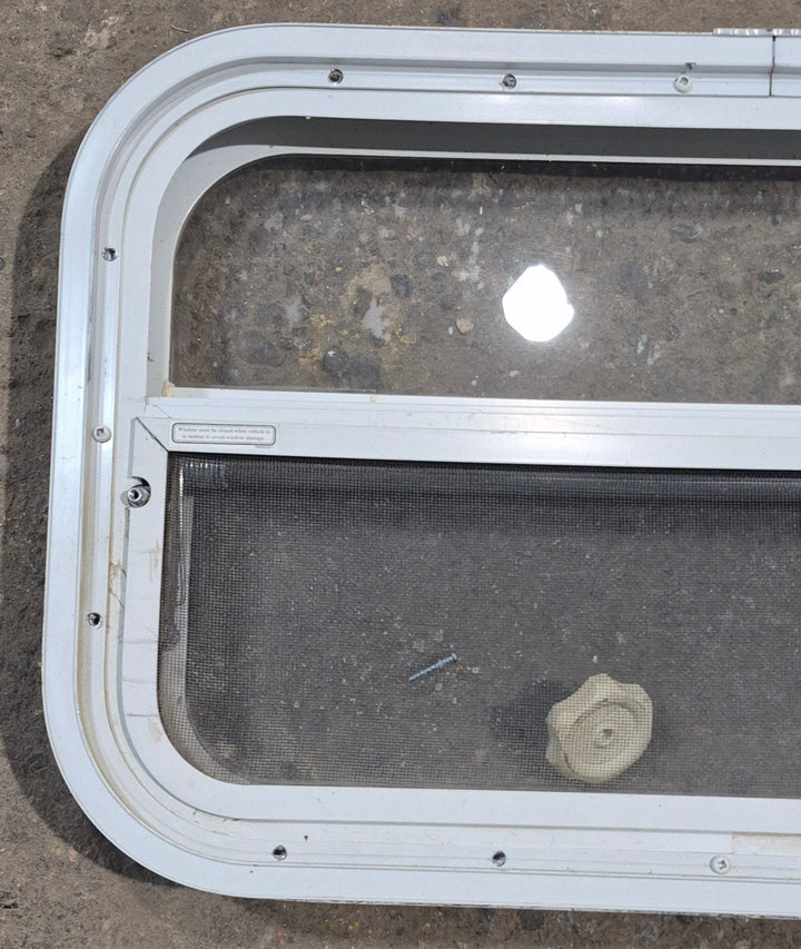 Used White Radius Opening Window : 23 1/2" W x 14 1/2" H x 1 7/8" D - Young Farts RV Parts