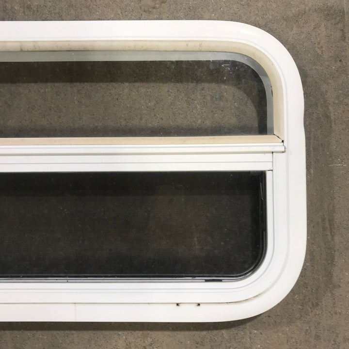 Used White Radius Opening Window : 23 1/2" W x 14 1/2" H x 1 7/8" D - Young Farts RV Parts