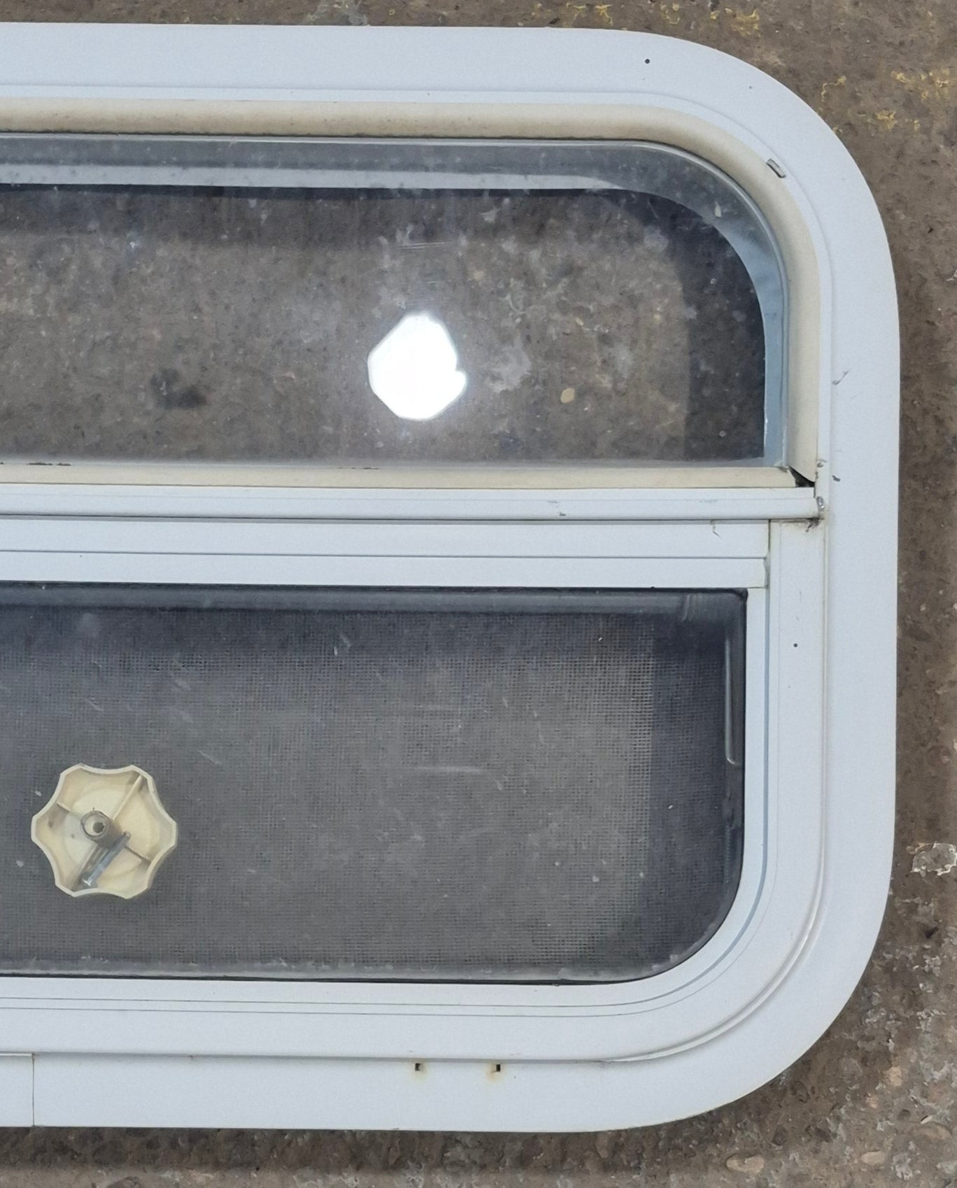 Used White Radius Opening Window : 23 1/2" W x 14 1/2" H x 1 7/8" D - Young Farts RV Parts