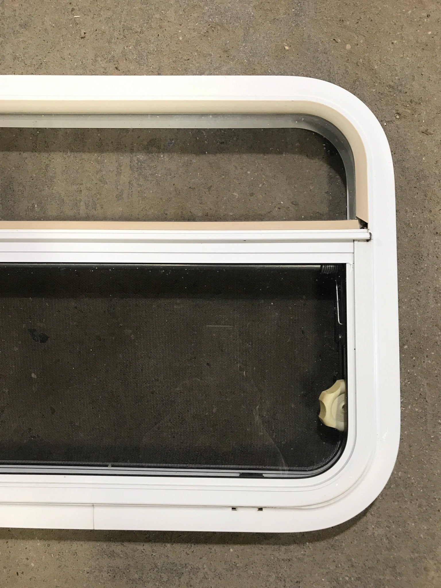 Used White Radius Opening Window : 23 1/2" W x 17 1/2" H x 1 1/2" D - Young Farts RV Parts