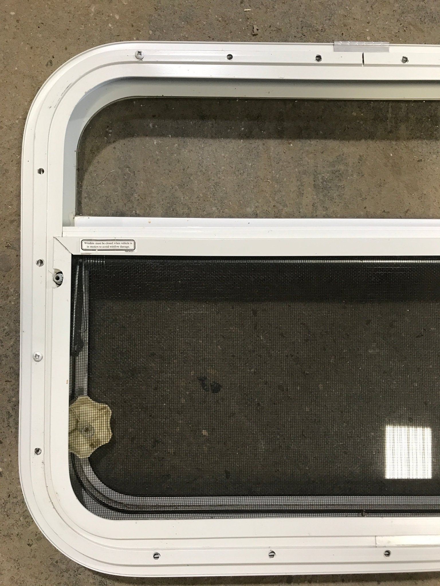 Used White Radius Opening Window : 23 1/2" W x 17 1/2" H x 1 1/2" D - Young Farts RV Parts