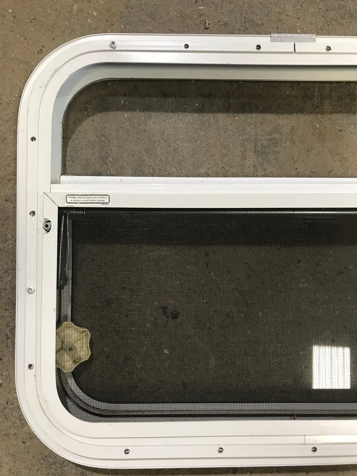 Used White Radius Opening Window : 23 1/2" W x 17 1/2" H x 1 1/2" D - Young Farts RV Parts