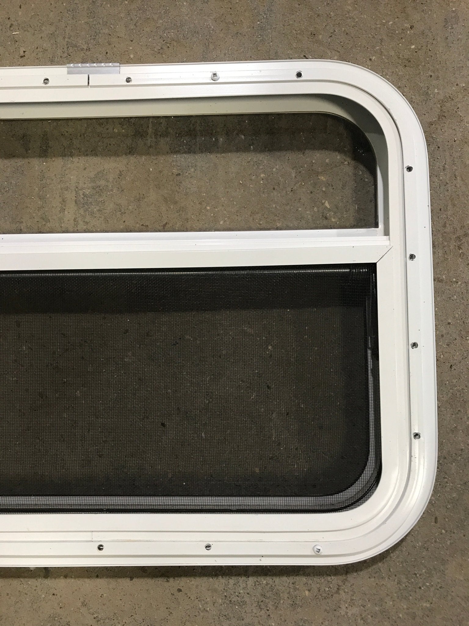 Used White Radius Opening Window : 23 1/2" W x 17 1/2" H x 1 1/2" D - Young Farts RV Parts