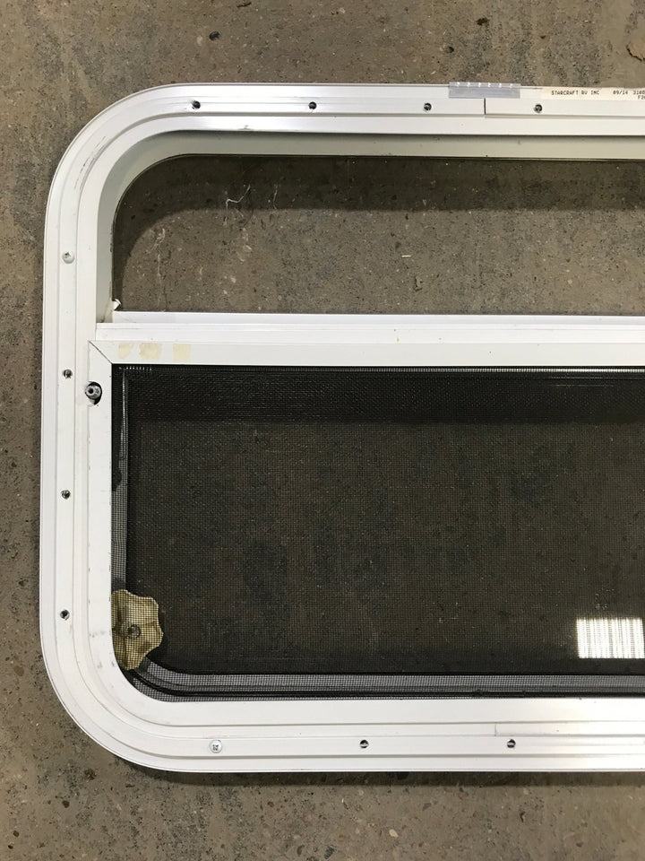 Used White Radius Opening Window : 23 1/2" W x 17 1/2" H x 1 1/2" D - Young Farts RV Parts