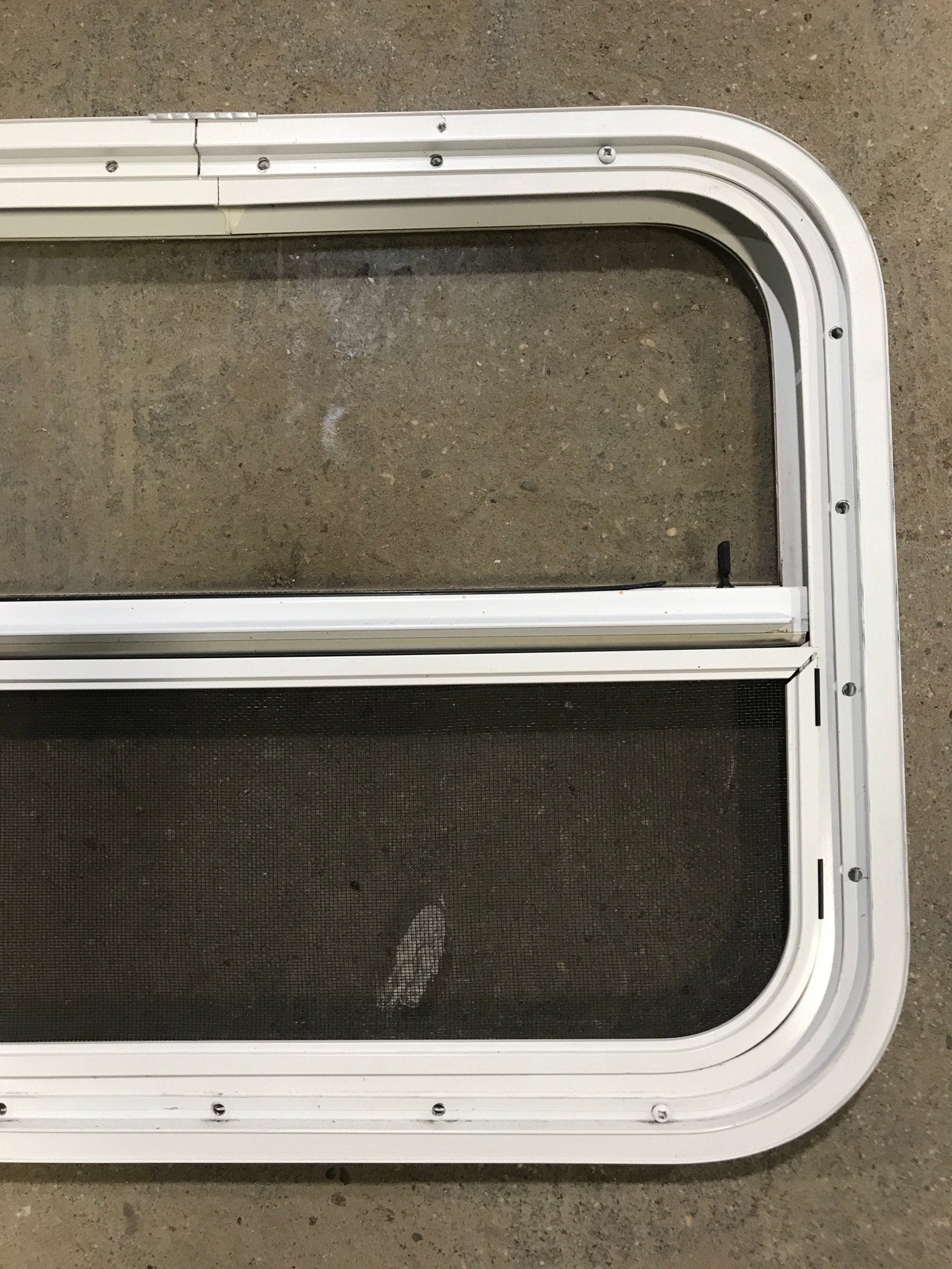 Used White Radius Opening Window : 23 1/2" W x 17 1/2" H x 1 1/2" D - Young Farts RV Parts