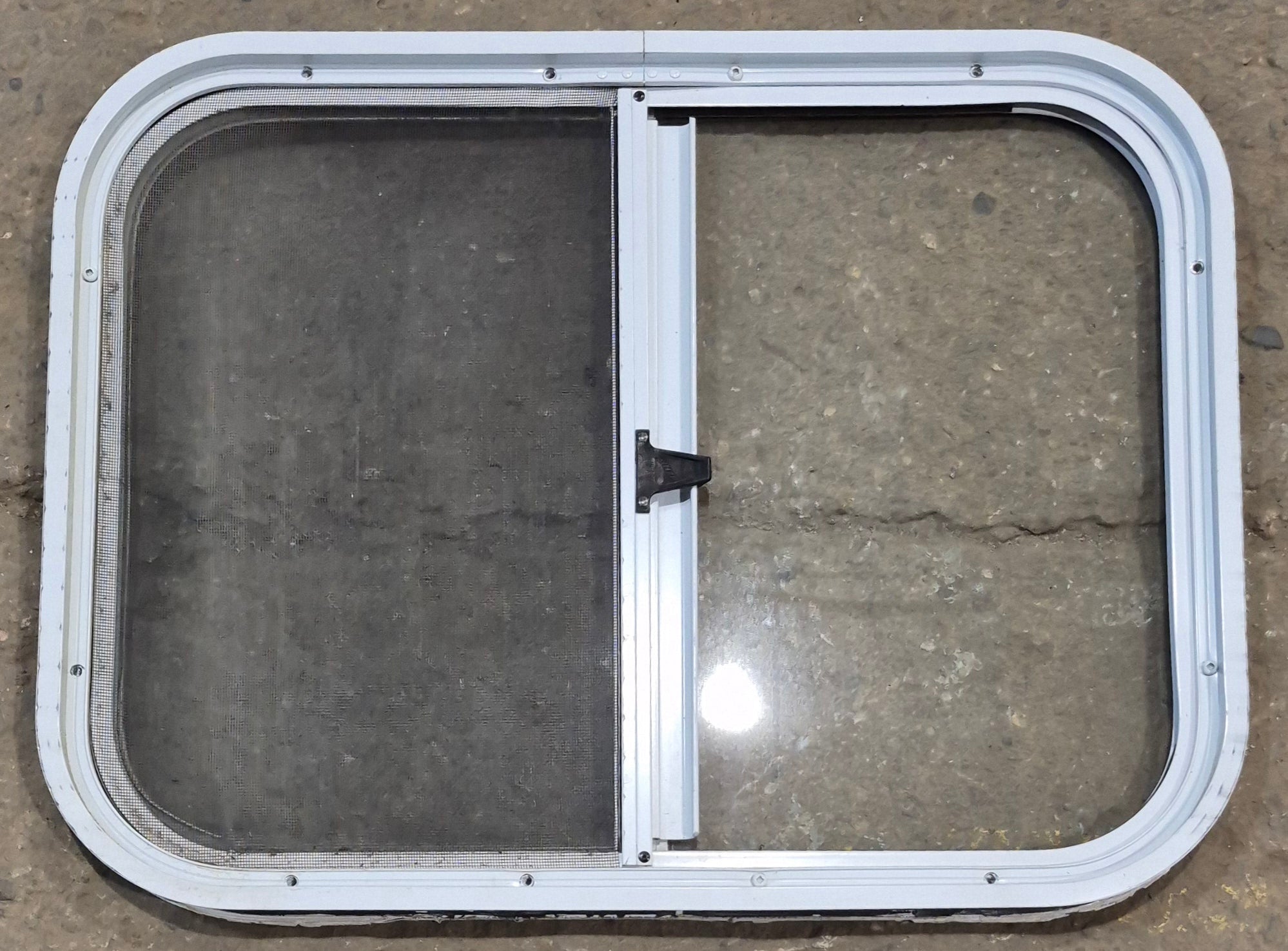 Used White Radius Opening Window : 23 1/2" W x 17 1/2" H x 1 1/4" D - Young Farts RV Parts