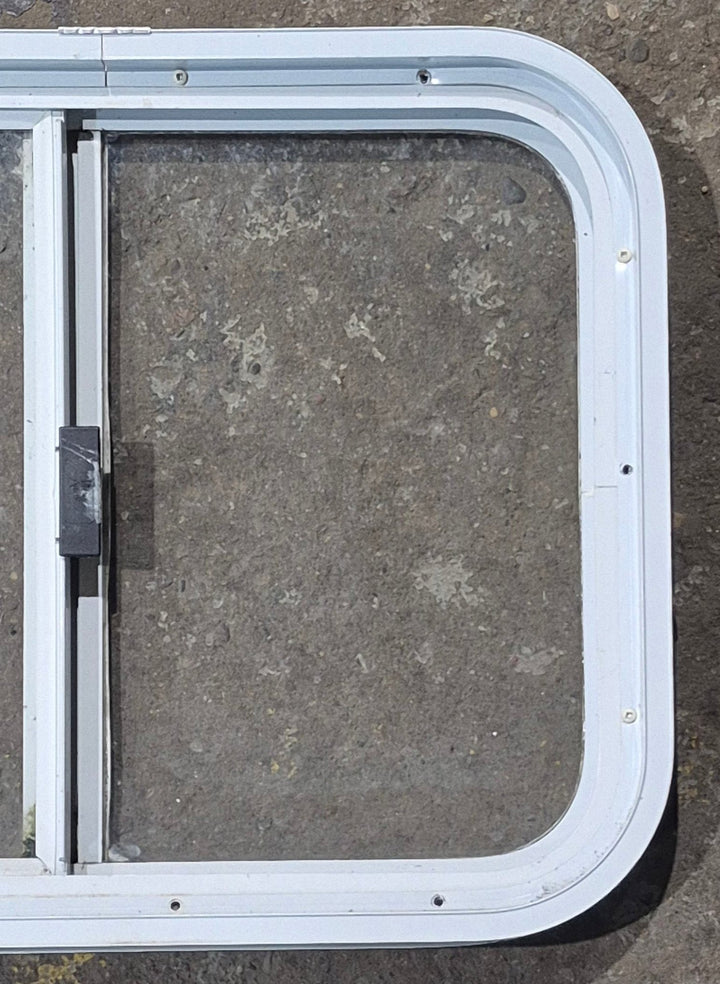 Used White Radius Opening Window : 23 1/2" W x 17 1/2" H x 1 7/8" D - Young Farts RV Parts