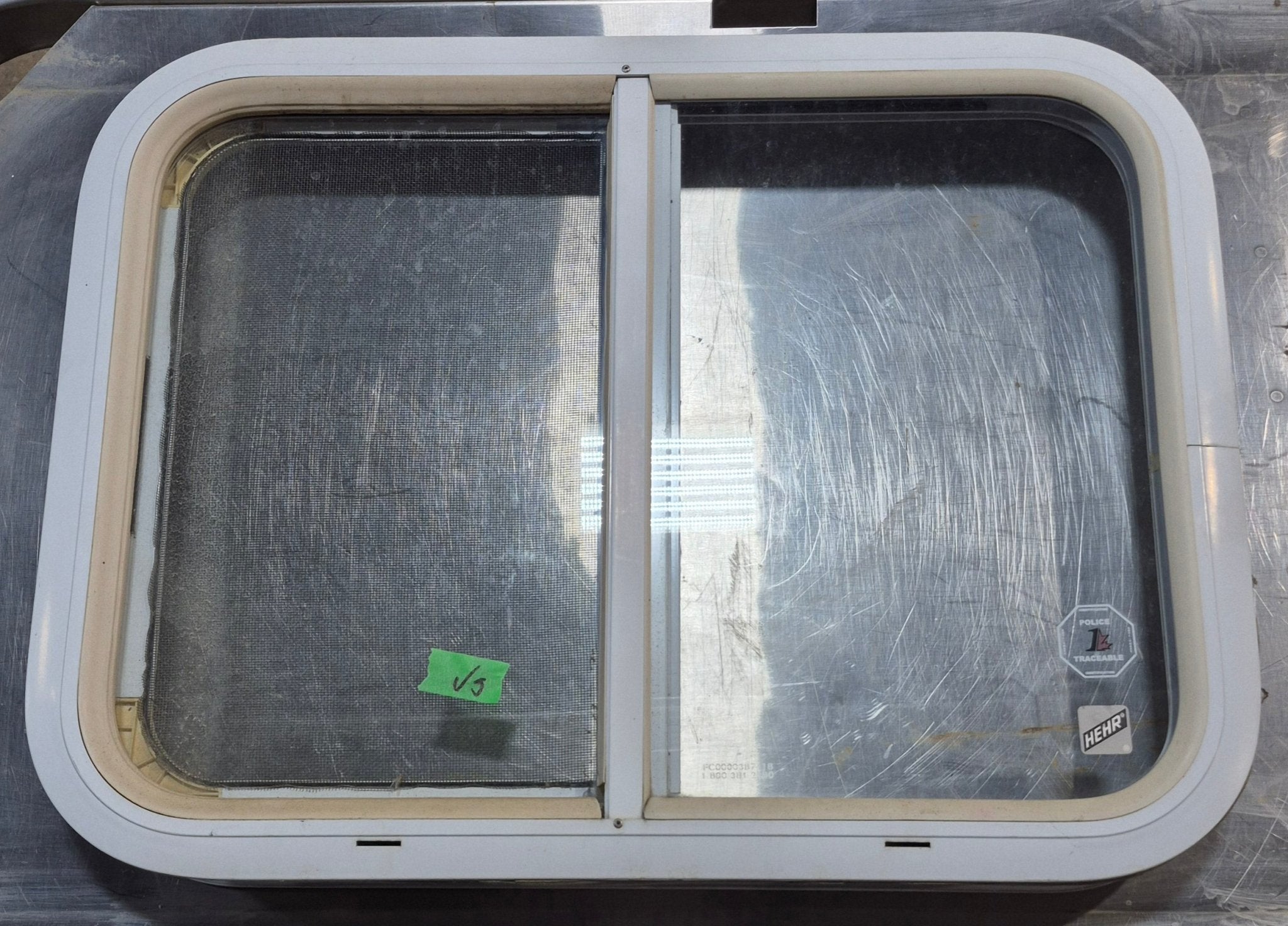 Used White Radius Opening Window : 23 1/2" W x 17 1/2" H x 1 7/8" D - Young Farts RV Parts