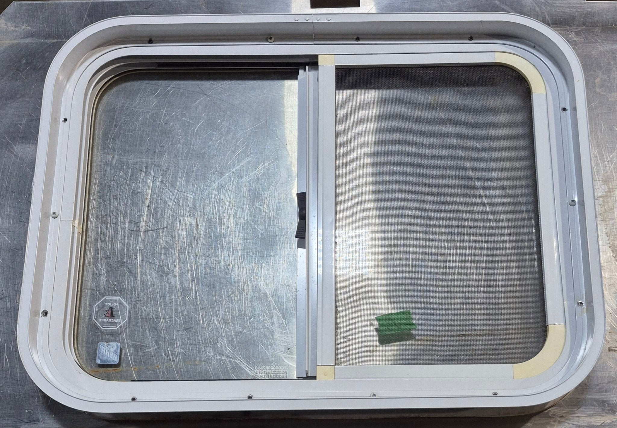 Used White Radius Opening Window : 23 1/2" W x 17 1/2" H x 1 7/8" D - Young Farts RV Parts