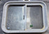 Used White Radius Opening Window : 23 1/2" W x 17 1/2" H x 1 7/8" D - Young Farts RV Parts