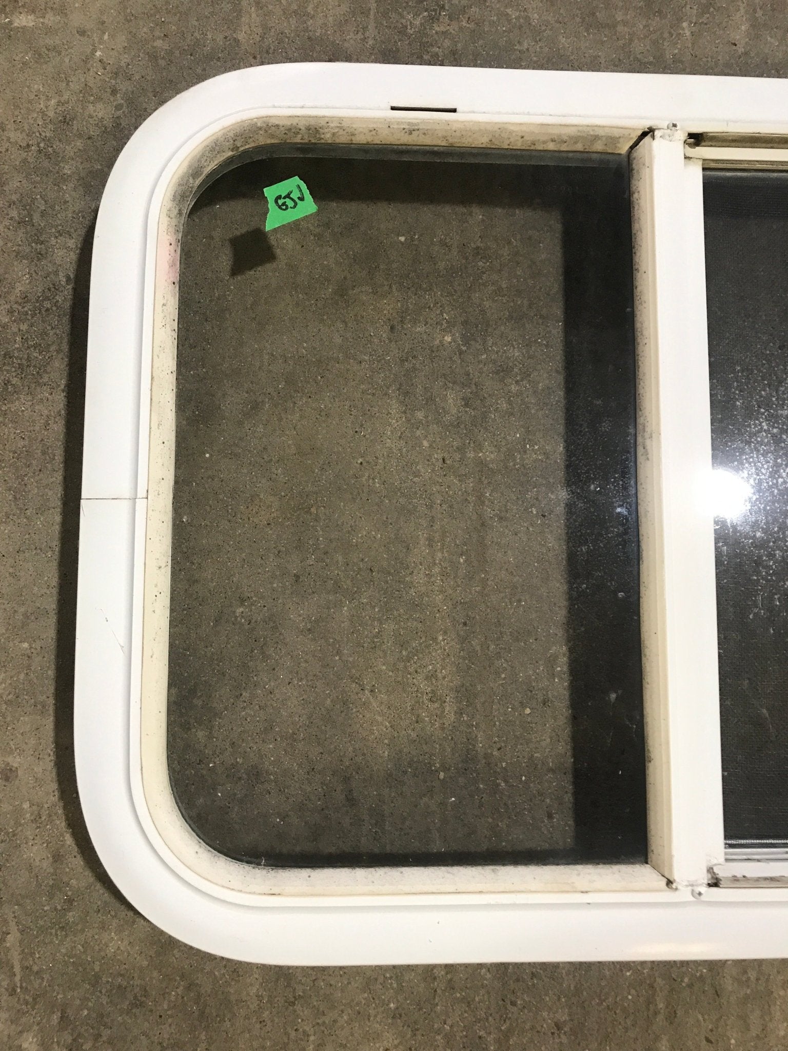 Used White Radius Opening Window : 23 1/2" W x 17 1/2" H x 1 7/8" D - Young Farts RV Parts