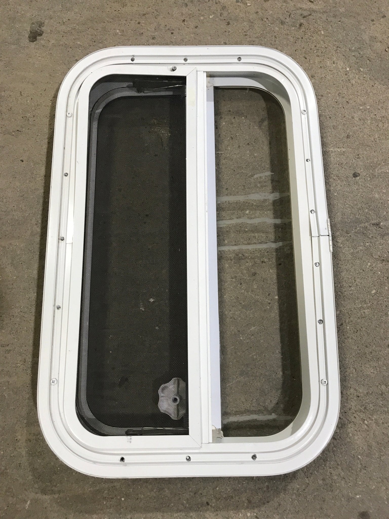 Used White Radius Opening Window : 23 1/4" W X 14 1/2" H X 1 1/2" D - Young Farts RV Parts