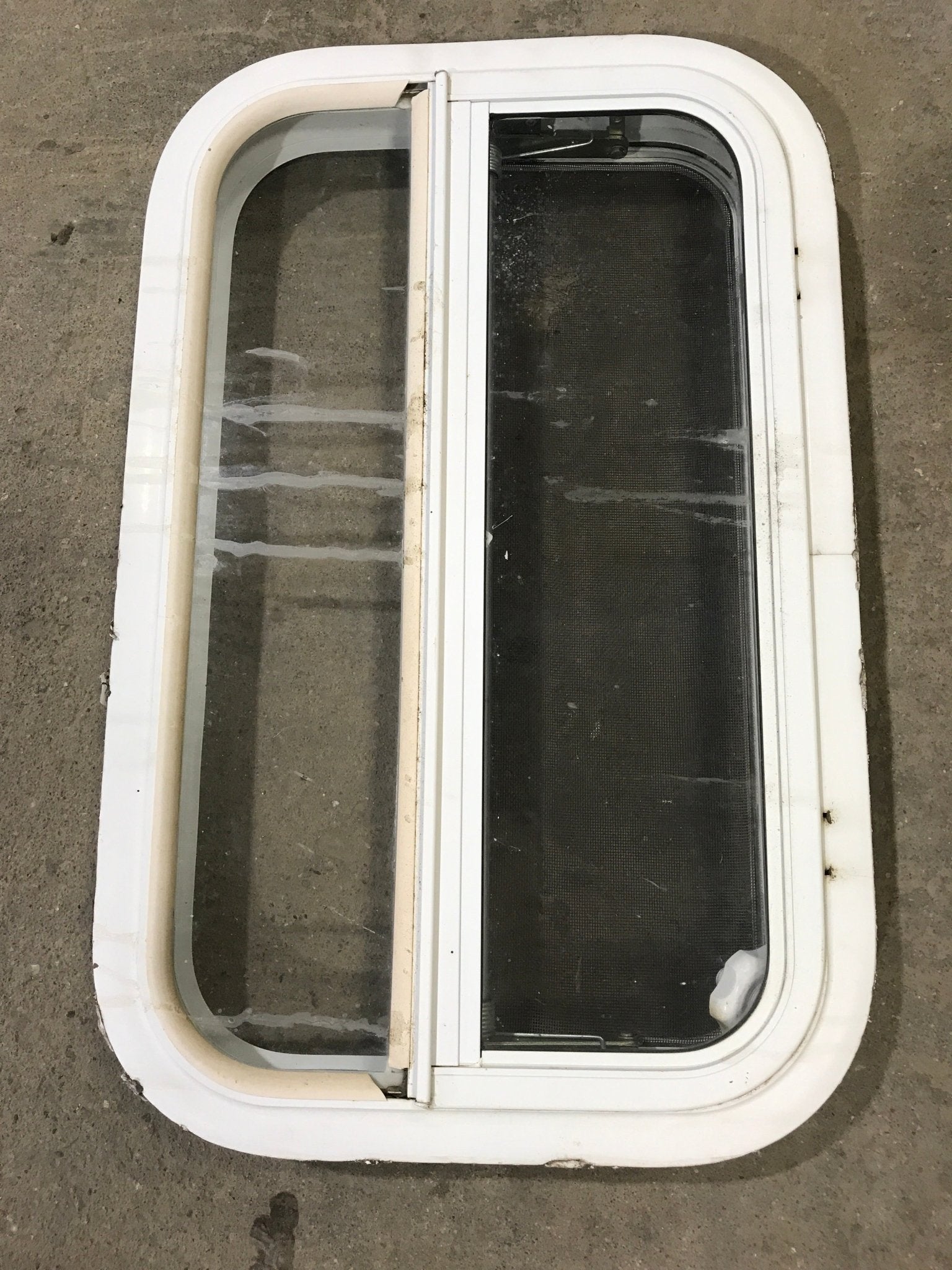 Used White Radius Opening Window : 23 1/4" W X 14 1/2" H X 1 1/2" D - Young Farts RV Parts