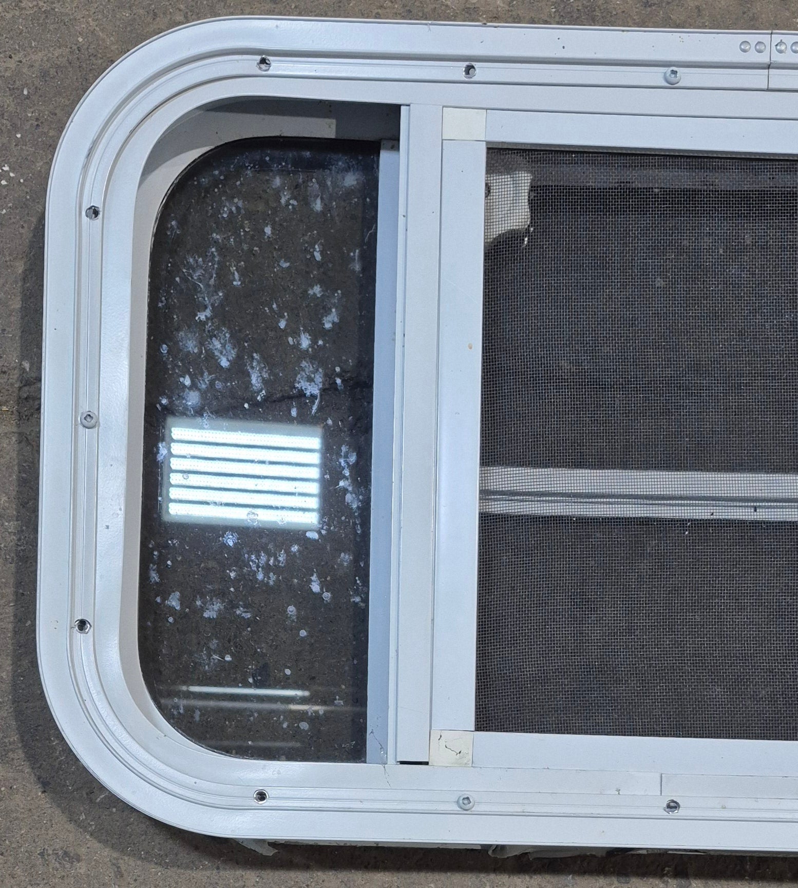 Used White Radius Opening Window : 23 1/4" W x 14 1/2" H x 1 7/8" D - Young Farts RV Parts