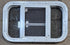 Used White Radius Opening Window : 23 1/4" W x 14 1/2" H x 1 7/8" D - Young Farts RV Parts