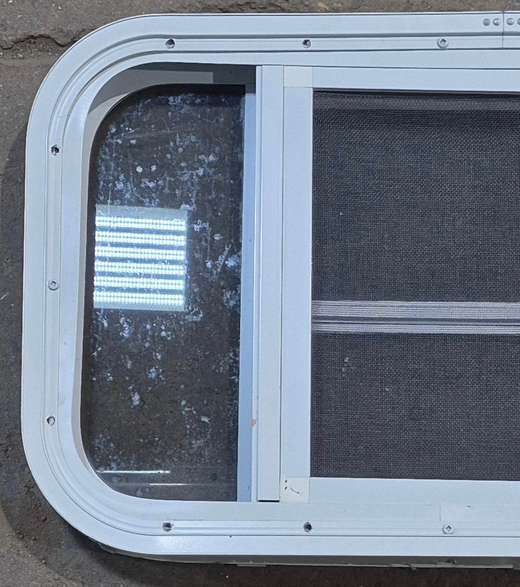 Used White Radius Opening Window : 23 1/4" W x 14 1/2" H x 1 7/8" D - Young Farts RV Parts