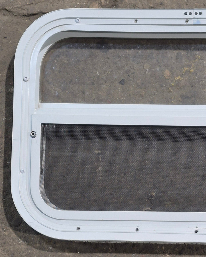 Used White Radius Opening Window : 23 1/4" W x 14 1/2" H x 1 7/8" D - Young Farts RV Parts