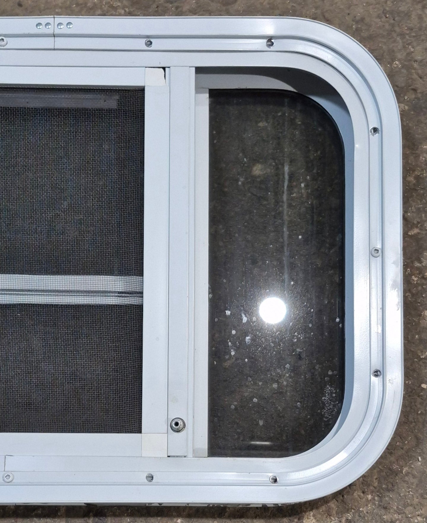 Used White Radius Opening Window : 23 1/4" W x 14 1/4" H x 1 7/8" D - Young Farts RV Parts