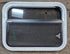 Used White Radius Opening Window : 23 1/4" W x 17 1/4" H x 1 3/4" D - Young Farts RV Parts