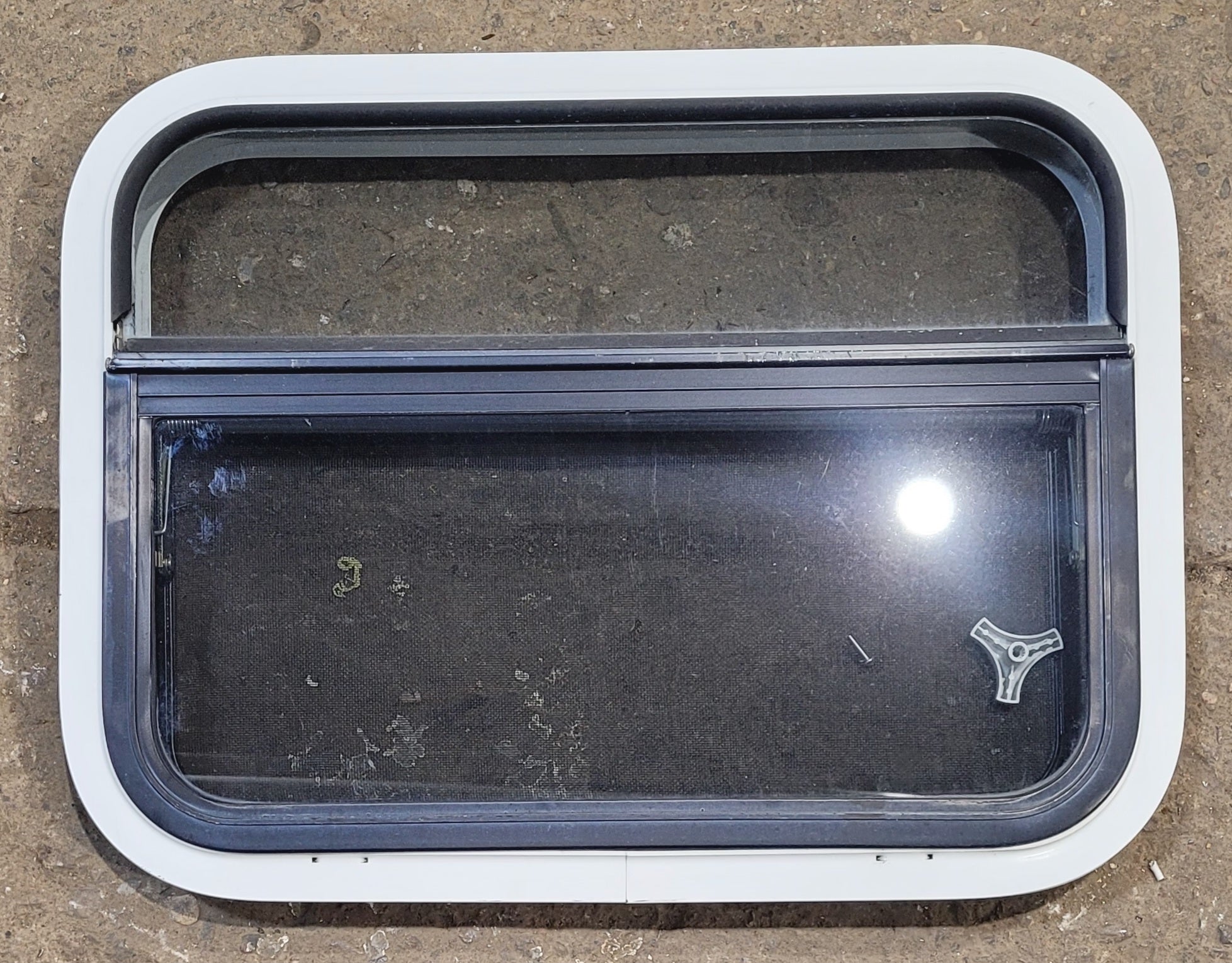 Used White Radius Opening Window : 23 1/4" W x 17 1/4" H x 1 5/8" D - Young Farts RV Parts