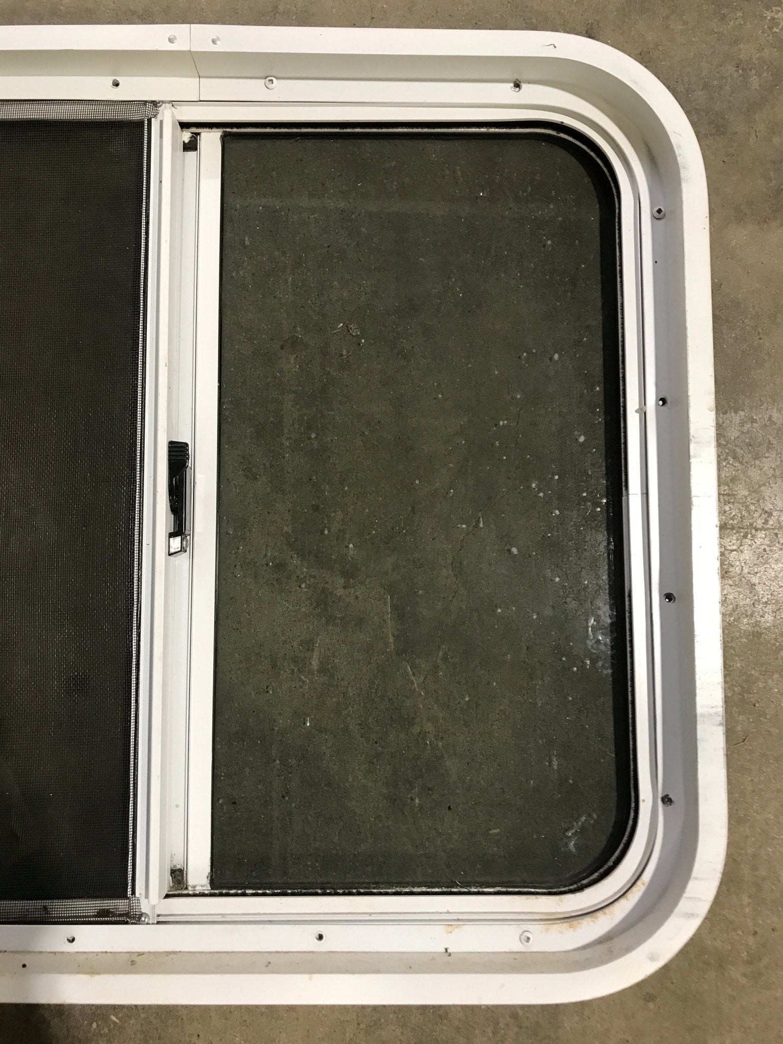 Used White Radius Opening Window : 24 1/2" W x 21 1/2" H x 1 7/8" D - Young Farts RV Parts