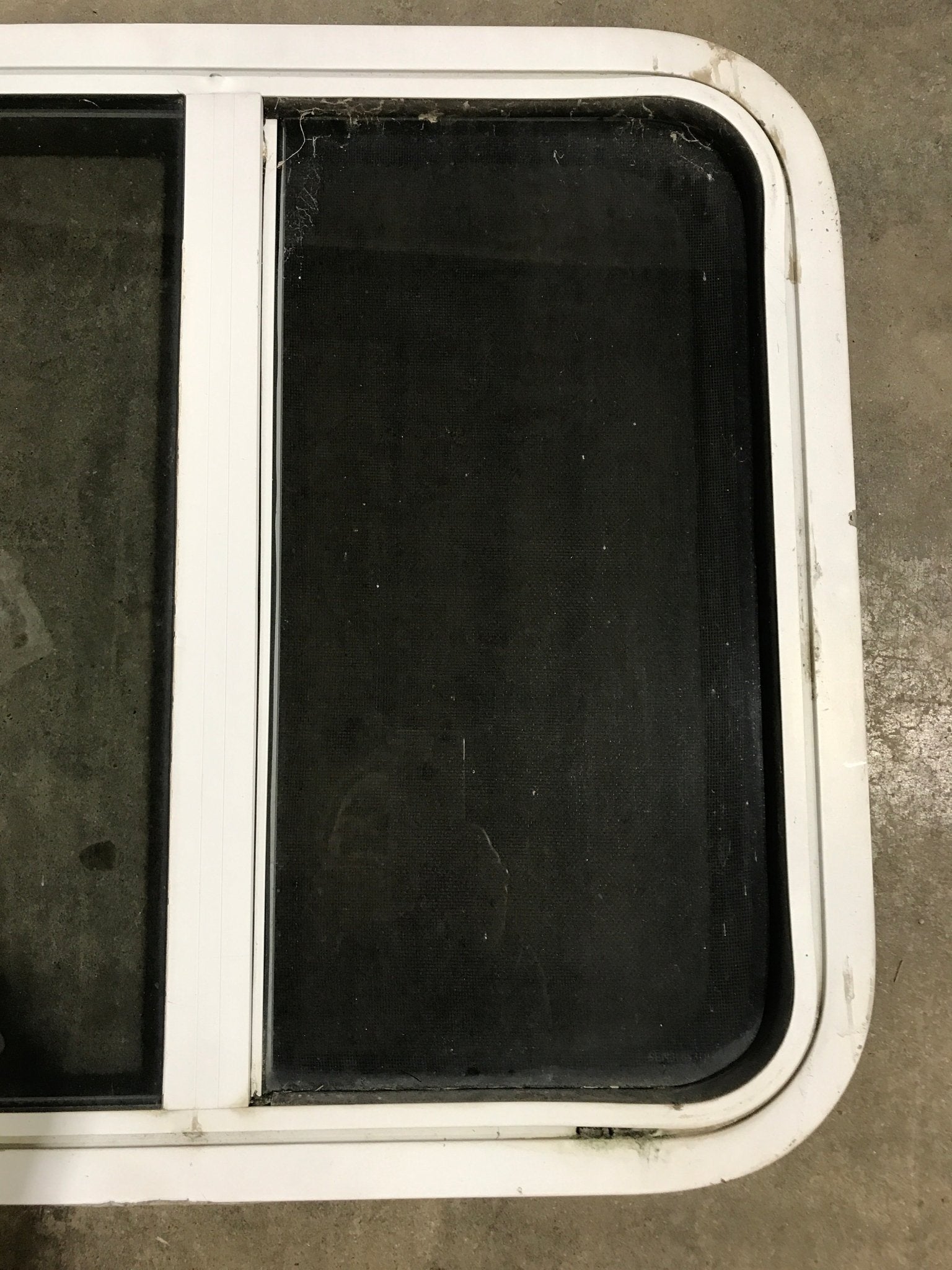 Used White Radius Opening Window : 24 1/2" W x 21 1/2" H x 1 7/8" D - Young Farts RV Parts