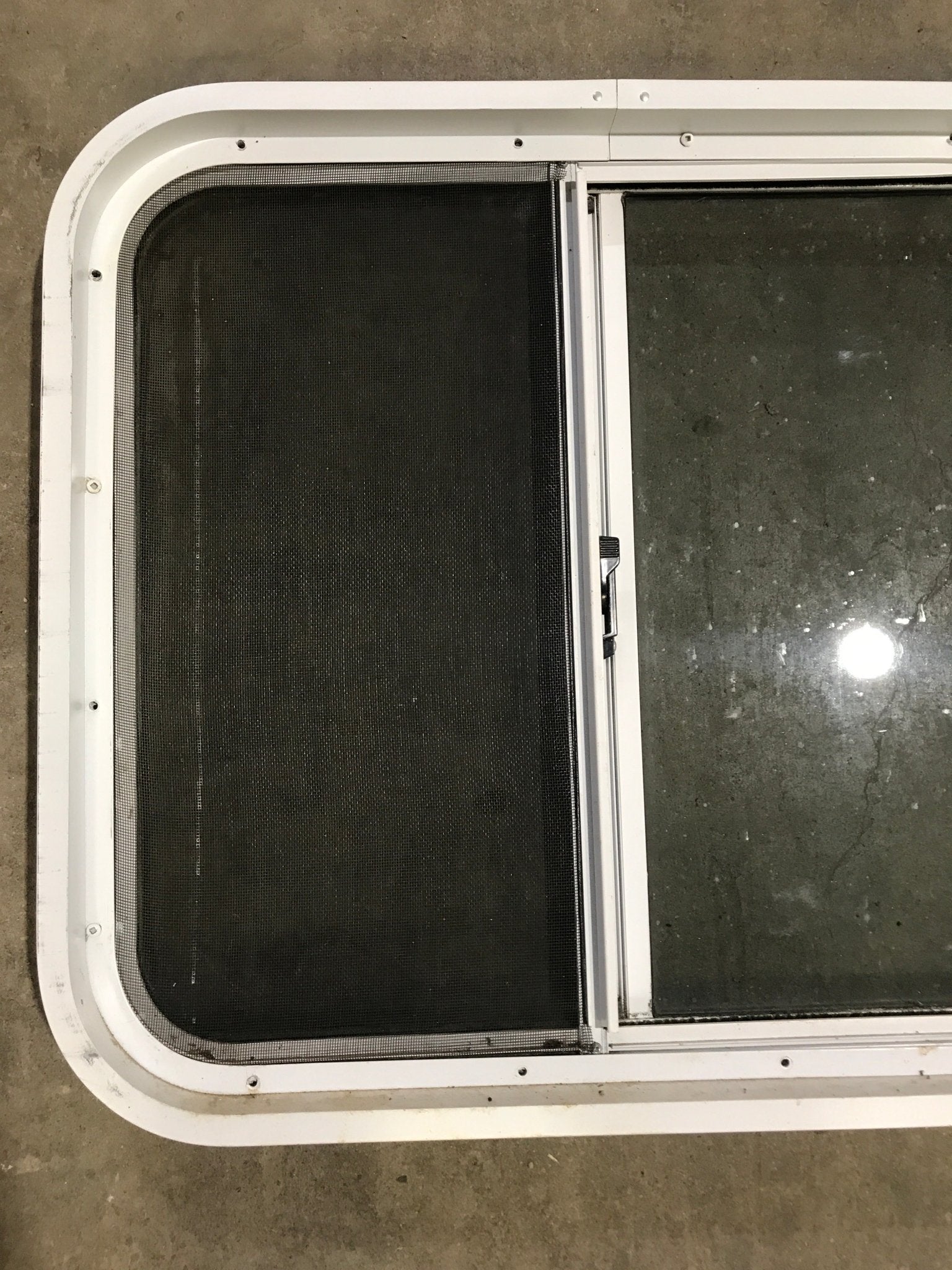 Used White Radius Opening Window : 24 1/2" W x 21 1/2" H x 1 7/8" D - Young Farts RV Parts