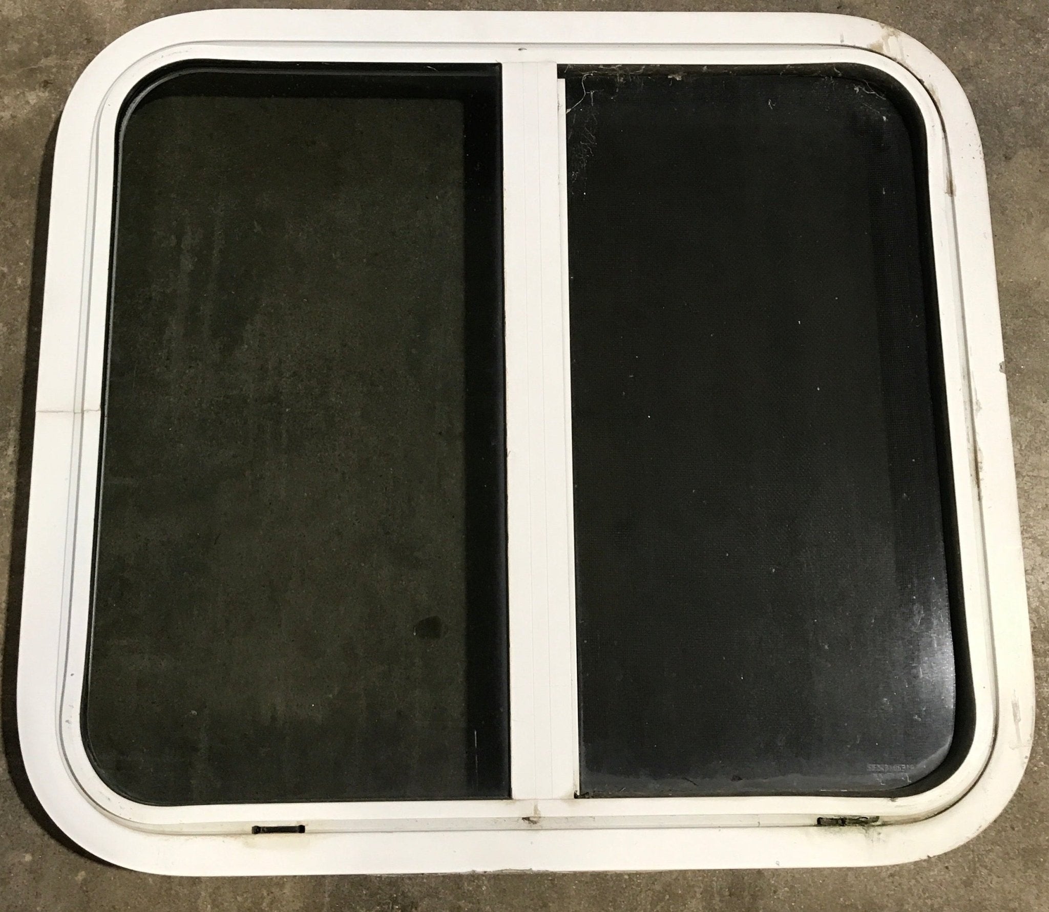 Used White Radius Opening Window : 24 1/2" W x 21 1/2" H x 1 7/8" D - Young Farts RV Parts