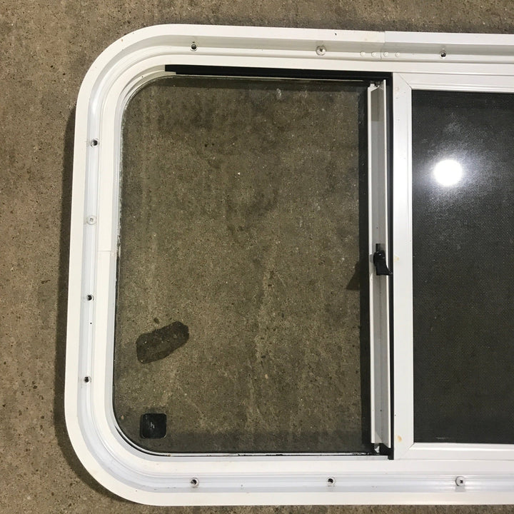 Used White Radius Opening Window : 24 1/4" W x 17 3/4" H x 1 7/8" D - Young Farts RV Parts