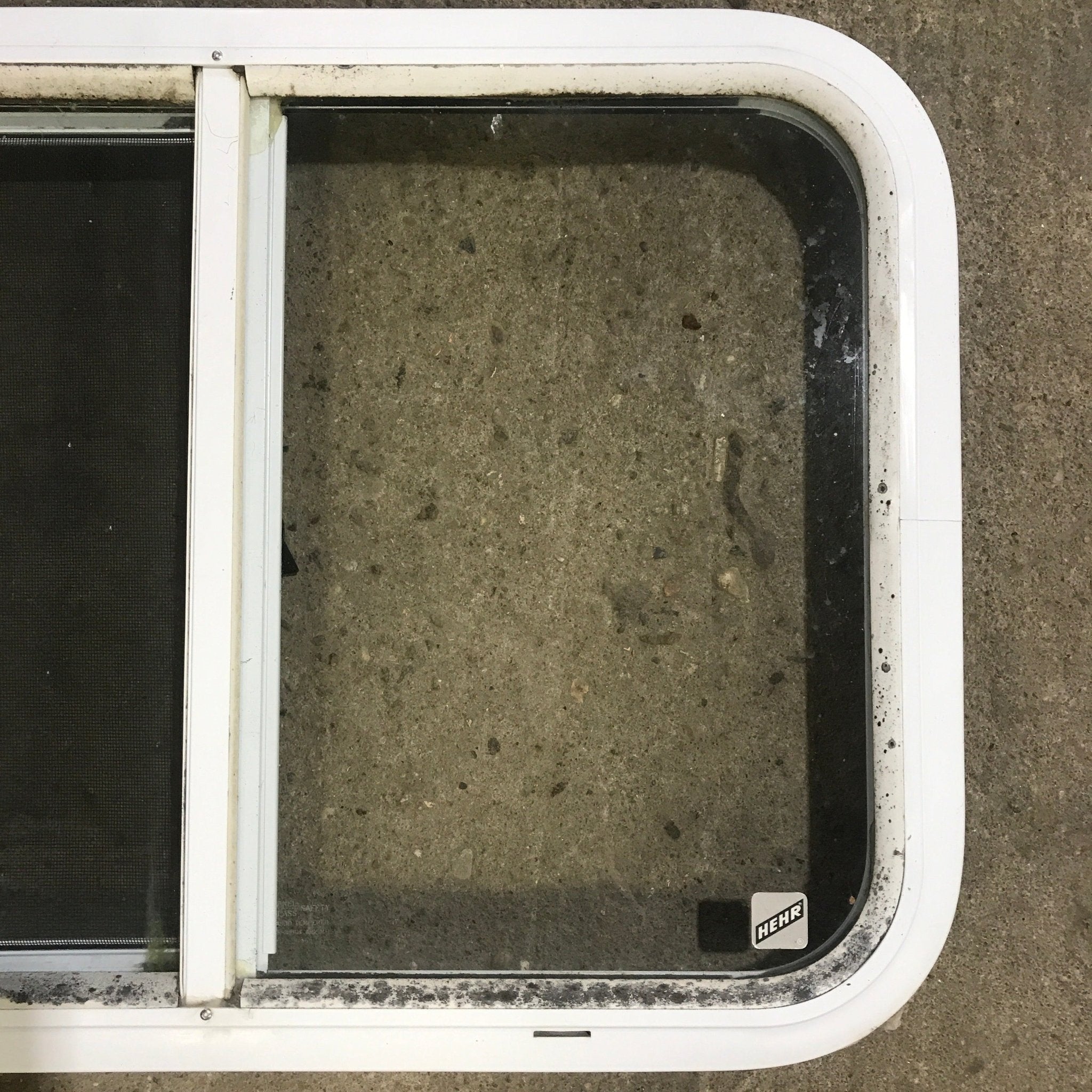 Used White Radius Opening Window : 24 1/4" W x 17 3/4" H x 1 7/8" D - Young Farts RV Parts