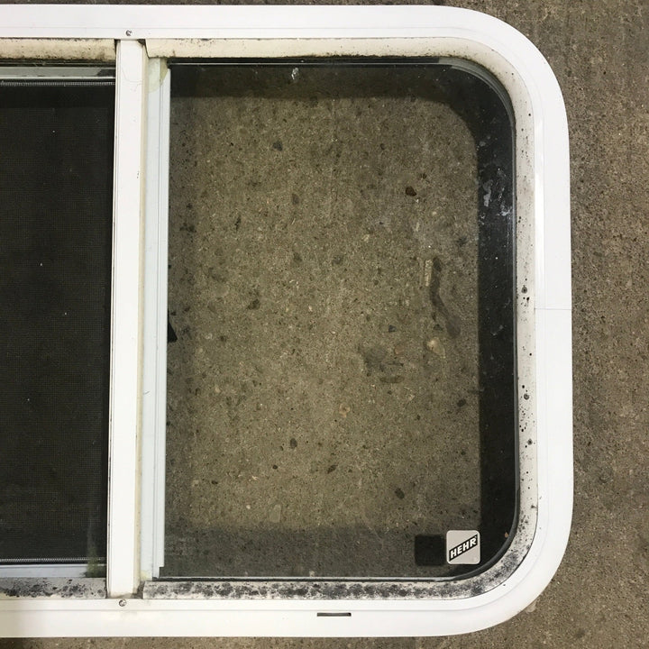 Used White Radius Opening Window : 24 1/4" W x 17 3/4" H x 1 7/8" D - Young Farts RV Parts