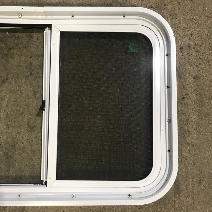 Used White Radius Opening Window : 24 1/4" W x 17 3/4" H x 1 7/8" D - Young Farts RV Parts