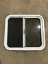 Used White Radius Opening Window : 24 1/4" W x 21 1/2" H x 2" D - Young Farts RV Parts