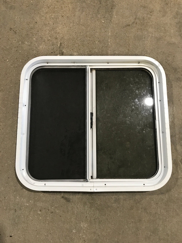 Used White Radius Opening Window : 24 1/4" W x 21 1/2" H x 2" D - Young Farts RV Parts