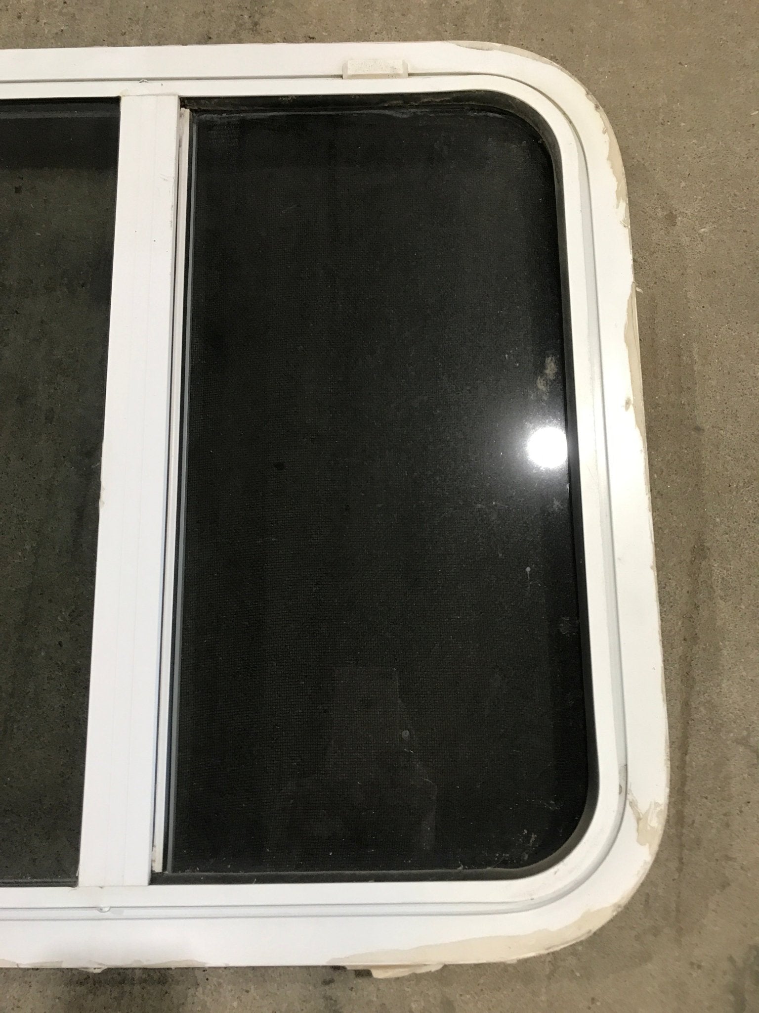 Used White Radius Opening Window : 24 1/4" W x 21 1/2" H x 2" D - Young Farts RV Parts