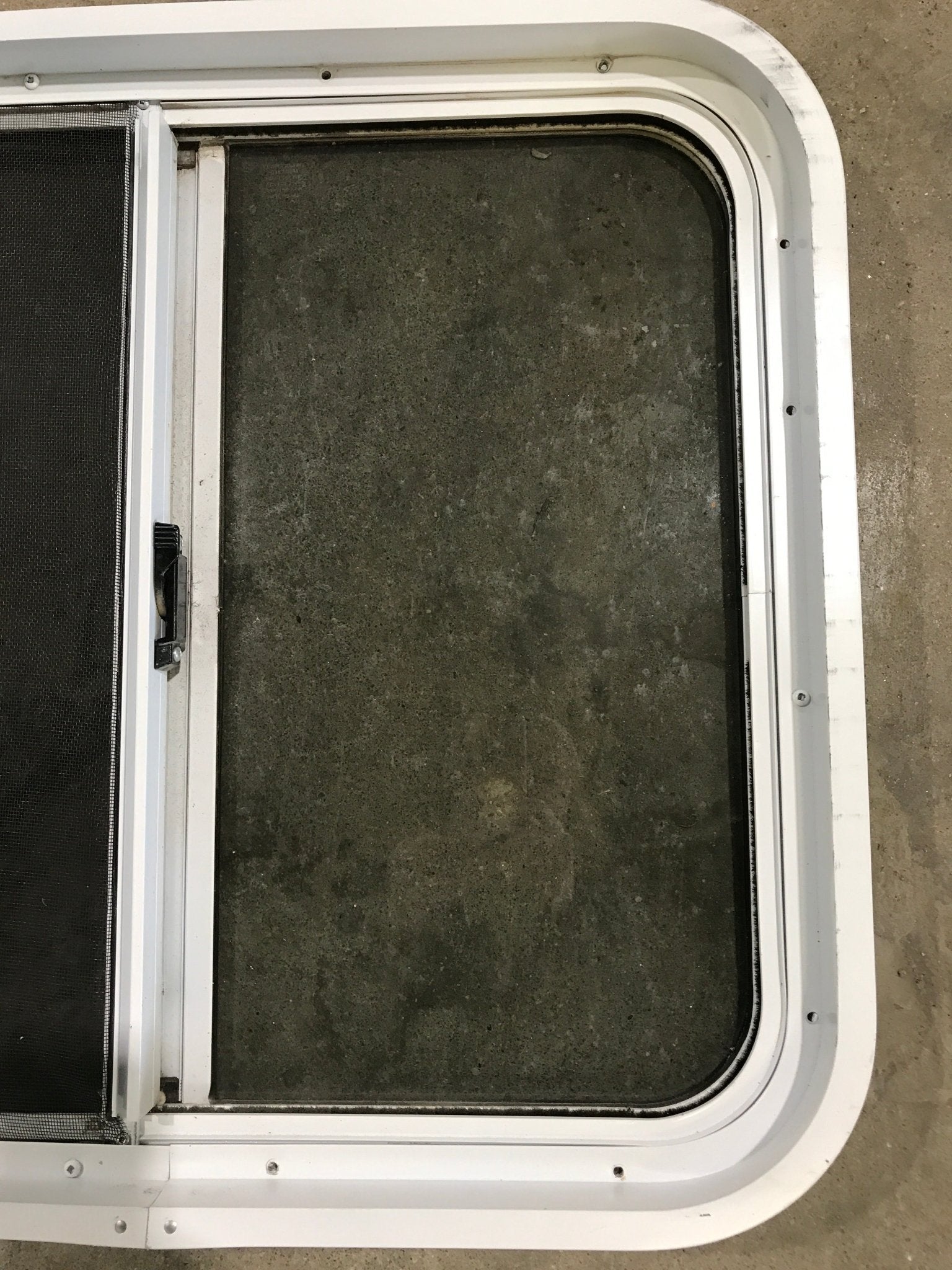 Used White Radius Opening Window : 24 1/4" W x 21 1/2" H x 2" D - Young Farts RV Parts
