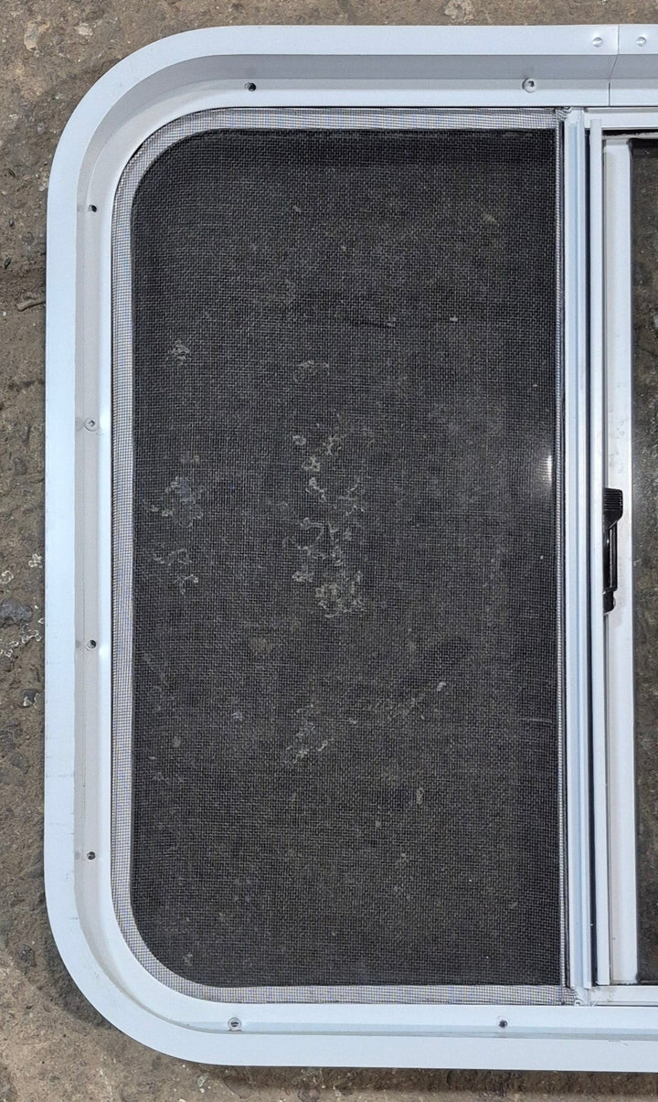 Used White Radius Opening Window : 24 1/4" W x 21 3/4" H x 1 7/8" D - Young Farts RV Parts
