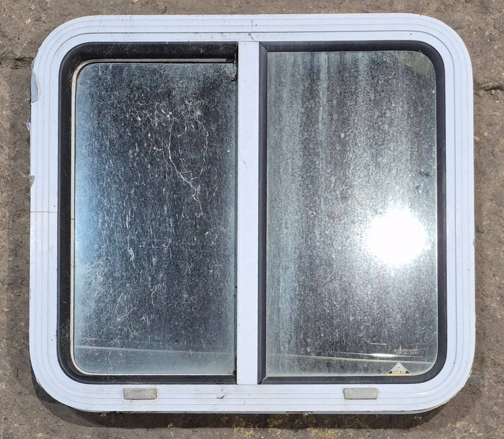 Used White Radius Opening Window : 24" W x 21 1/2" H x 1 7/8" D - Young Farts RV Parts