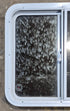 Used White Radius Opening Window : 24" W x 21 1/2" H x 1 7/8" D - Young Farts RV Parts