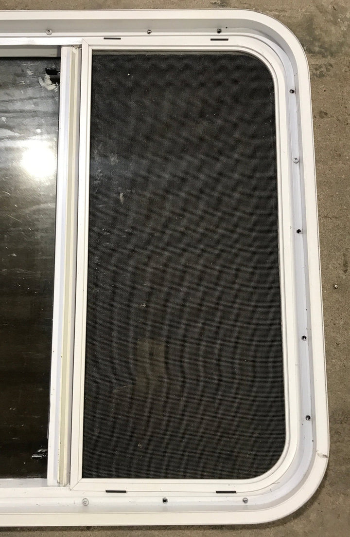 Used White Radius Opening Window : 25 1/2" W x 25 1/2" H x 1 7/8" D - Young Farts RV Parts