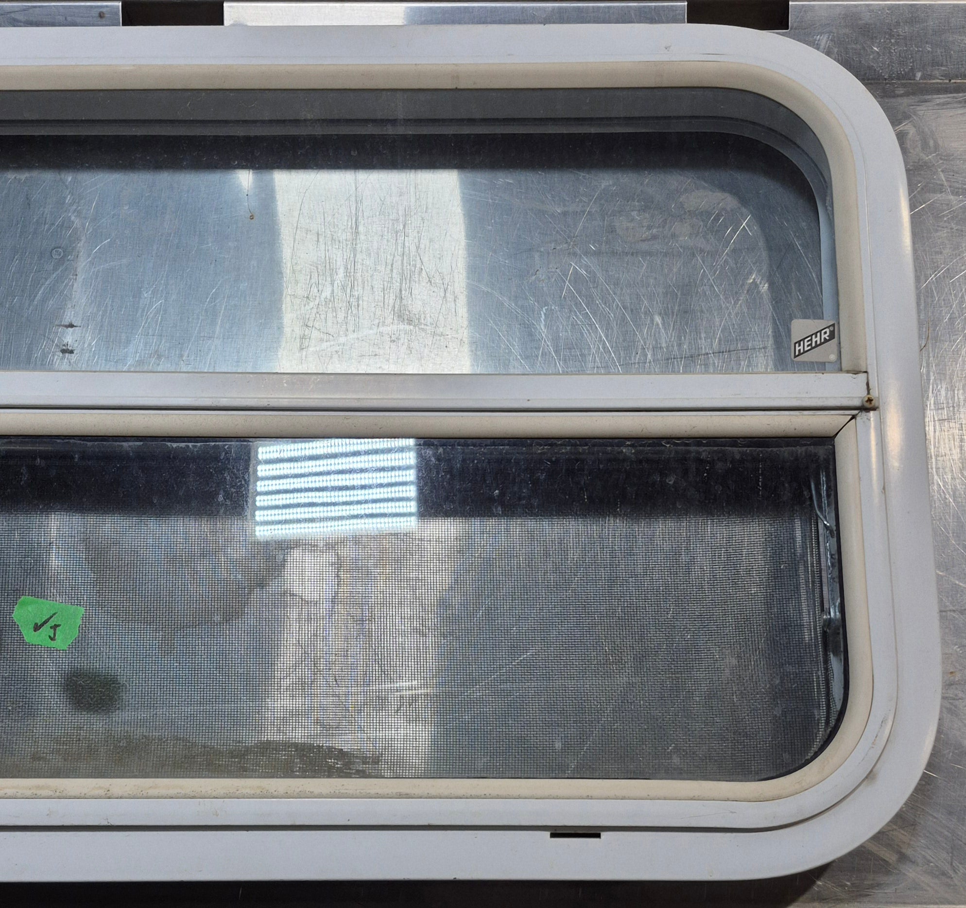 Used White Radius Opening Window : 29 1/2" W x 17 1/2" H x 1 7/8" D - Young Farts RV Parts